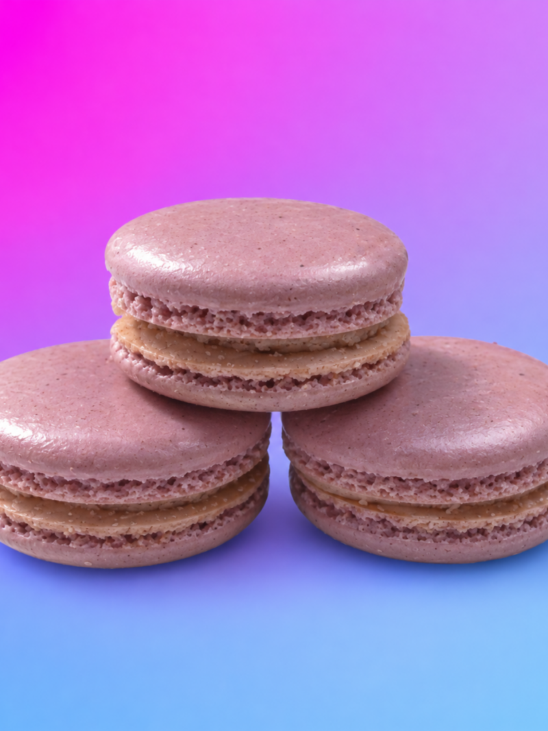 Churro Macarons with cinnamon-sugar flavor and American buttercream