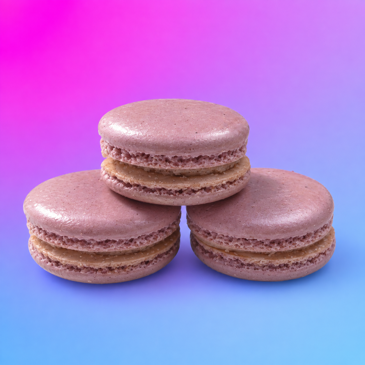 Churro Macarons with cinnamon-sugar flavor and American buttercream
